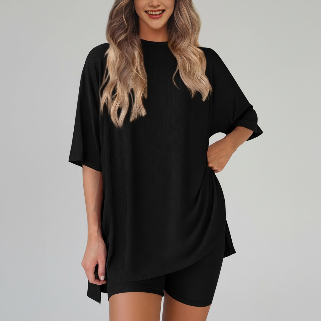 Woman wearing a black dress with a white background