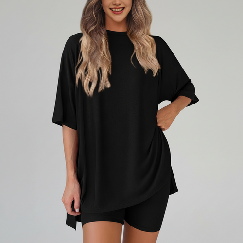Woman wearing a black dress with a white background